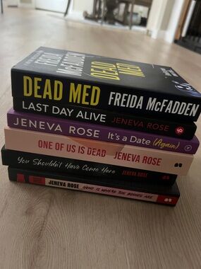 Stack of Thriller Paperbacks with Bold Spine Colors